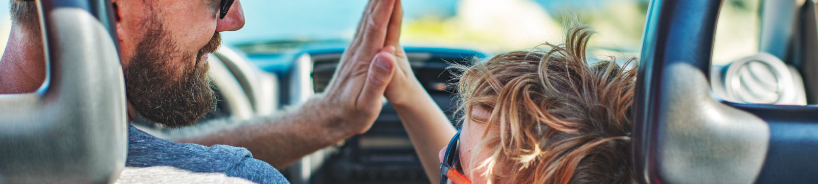 father and child high five